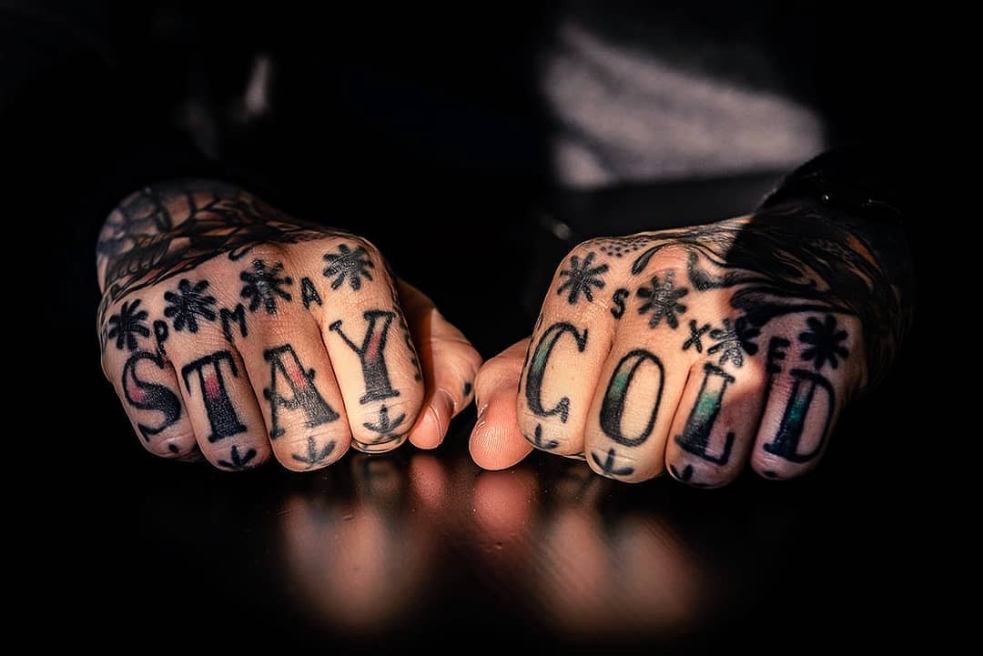 tatuagem pequena na mão